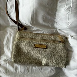 Michael Kors wristlet MK symbols